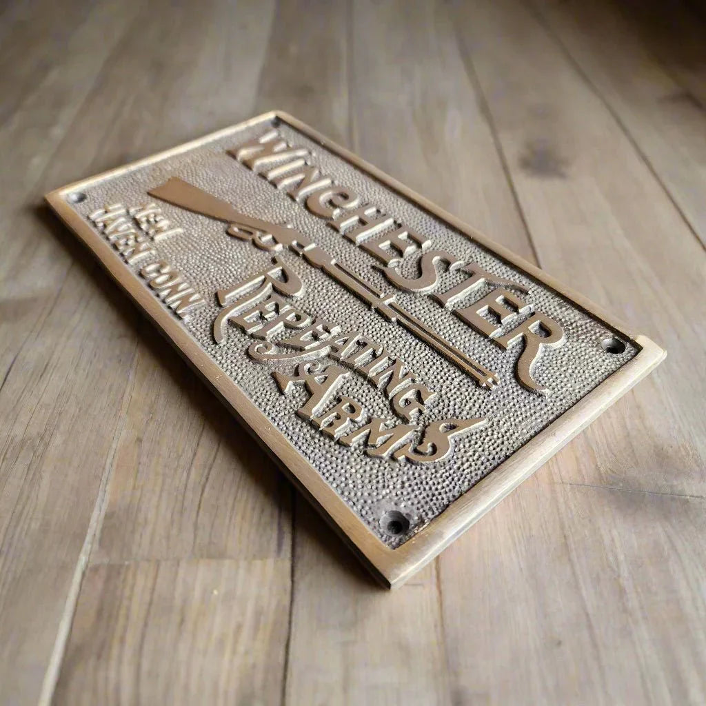 Winchester Repeating Arms Solid Brass Plaque With Raised Lettering (6.75" x 3.75") - Jones Peak
