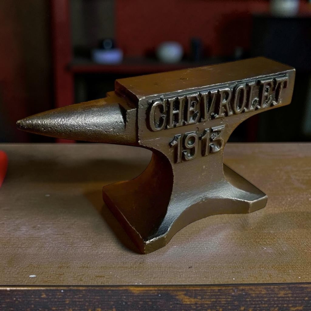 Chevrolet 1913 Cast Iron Anvil Paperweight With Raised Lettering And Antique Finish (4.5" x 2.75") - Jones Peak