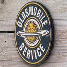 Oldsmobile Service Round Embossed Metal Magnet alternate view