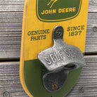 Vintage John Deere logo wall bottle opener by Open Roads, featuring a rustic design and sturdy metal construction.