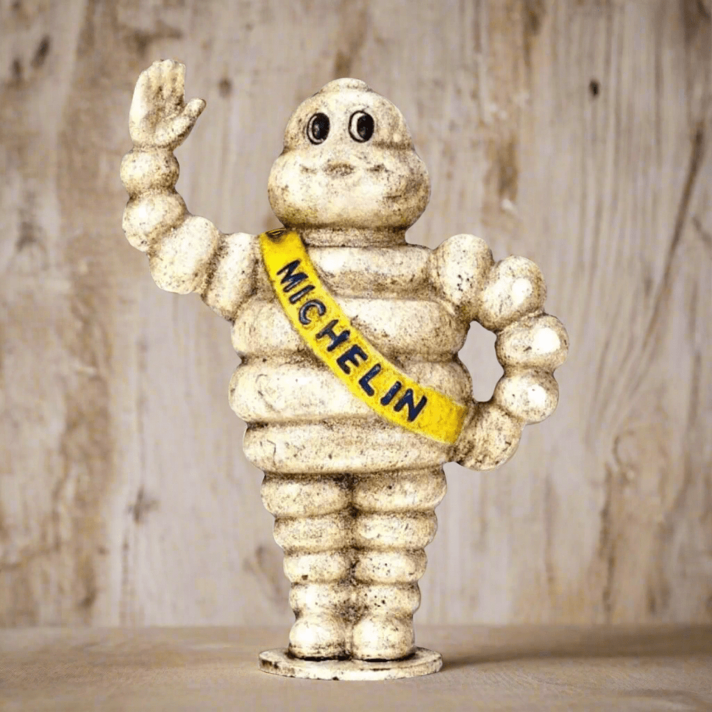 Tire Man Cast Iron Coin Bank With Painted Antique Finish (8.5" x 6") - Jones Peak