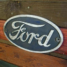 Ford Logo Cast Iron Painted Plaque With Antique Finish (9" x 5.25") - Jones Peak