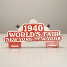 Jones Peak 1940 World's Fair New York aluminum license plate topper with hand-painted antique patina.
