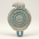 Jones Peak Automobile Club 1902 Bear FOB License Plate Topper, aluminum with antique patina finish, features a bear and AAA logo.