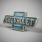 Jones Peak Chevrolet cast iron embossed plaque with raised silver lettering on blue background, antique finish.