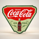 Jones Peak Coca-Cola Ice-Cold embossed metal magnet with vintage bottle graphic.