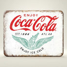 Jones Peak Coca-Cola Established 1886 vintage metal magnet with red logo and winged bottle design.
