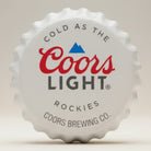 Coors Light bottle cap metal sign with silver background, red lettering and blue mountain graphic