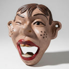 Jones Peak Howdy Doody cast iron wall bottle opener with a winking eye and open mouth.