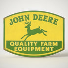 Jones Peak John Deere Quality Farm Equipment embossed metal magnet, yellow and green with leaping deer.