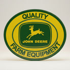 Jones Peak John Deere Farm Equipment embossed metal magnet with deer logo and yellow text.