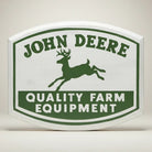 Jones Peak John Deere wood magnet with green deer logo and "Quality Farm Equipment" text. White wood.