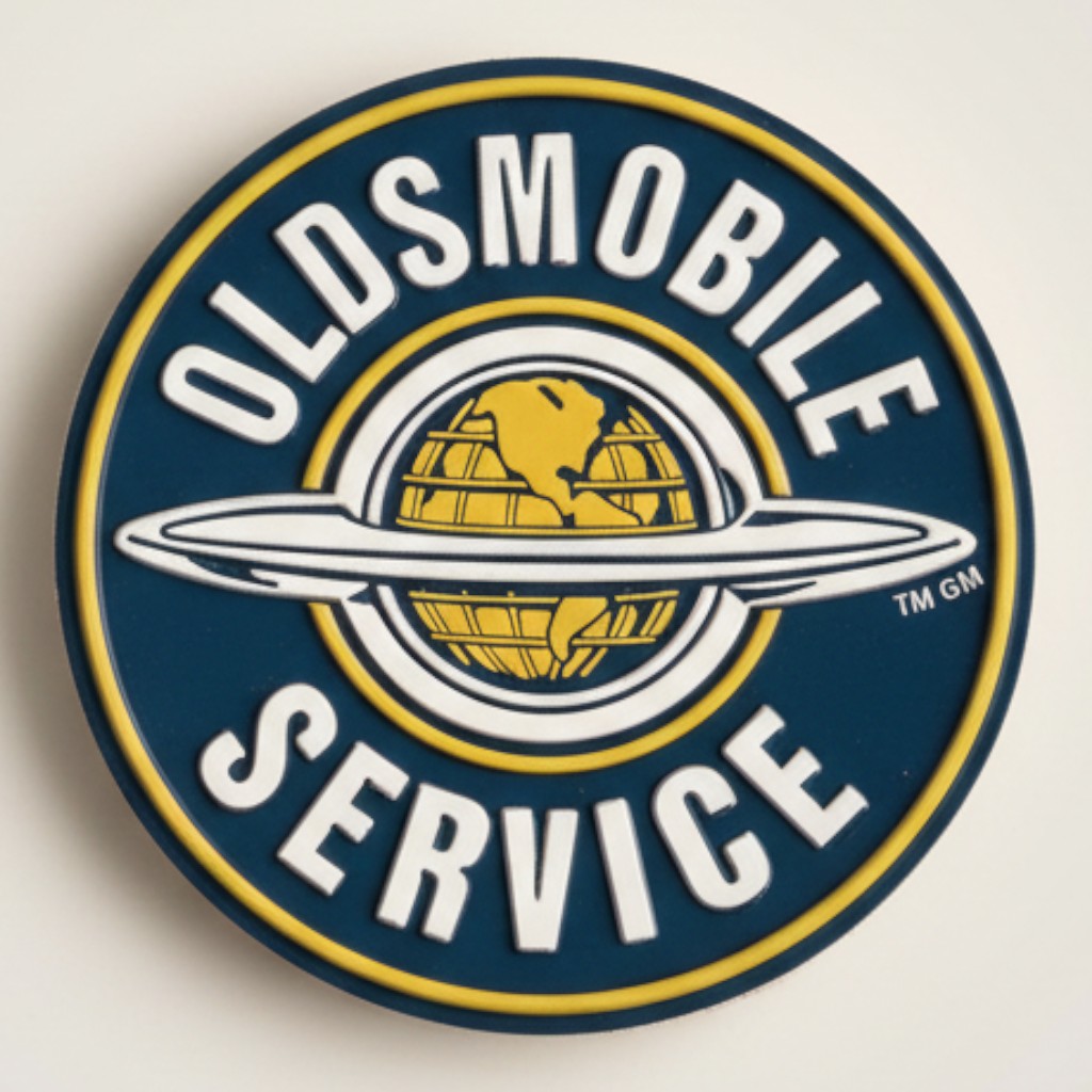Jones Peak Oldsmobile Service round embossed metal magnet with vintage logo and globe design.