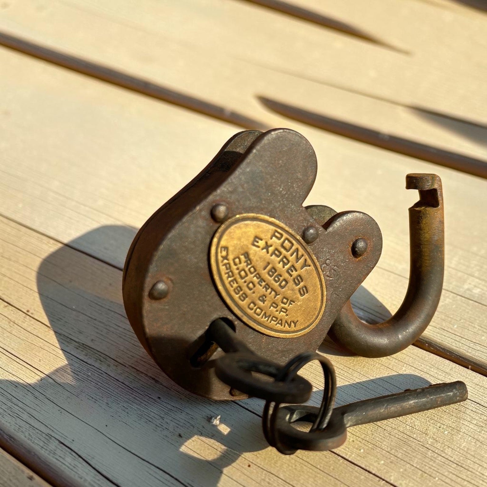 Jones Peak Pony Express 1860 cast iron lock with brass tag and keys. Antique distressed finish.