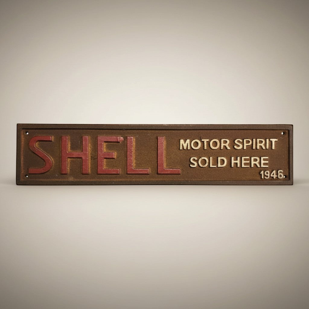 Jones Peak Shell Motor Spirit Sold Here 1946 cast iron embossed plaque with red lettering and antique patina finish.