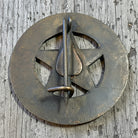 Jones Peak solid brass Texas Ranger badge with antique finish and star cutouts. Decorative reproduction with pin back.