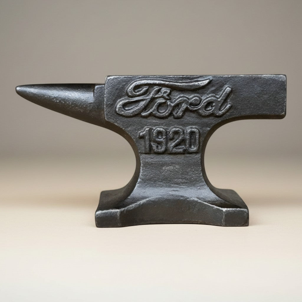 Jones Peak black cast iron anvil paperweight with Ford 1920 logo, antique finish, for desk or workshop.