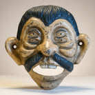 Jones Peak Four-Eyed Pepe cast iron wall bottle opener with antique finish and dark blue hair and mustache.