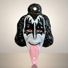 Jones Peak black and white cast iron bottle opener shaped like Gene Simmons' face with a pink tongue.