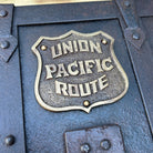 Jones Peak Union Pacific Route cast iron strong box with brass tag, distressed finish, decorative storage.