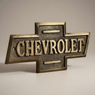 Jones Peak solid brass Chevrolet embossed plaque with antique patina finish, perfect for garages or collector displays.