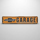 Jones Peak Chevrolet Garage street sign magnet, orange embossed metal with black lettering and vintage distressed finish.