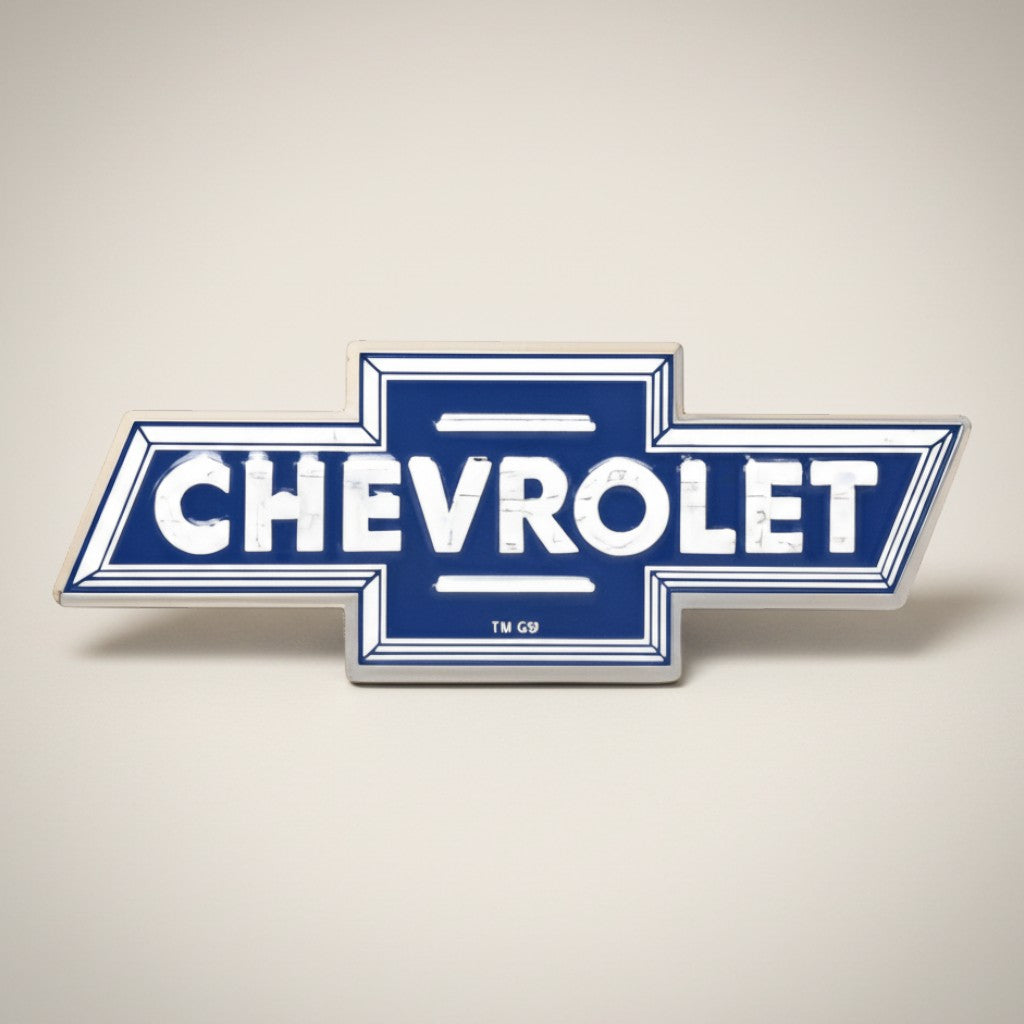 Jones Peak Chevrolet logo embossed metal magnet, blue and white vintage design.