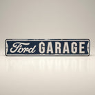 Jones Peak Ford Garage street sign metal magnet with embossed white lettering on a dark blue background.