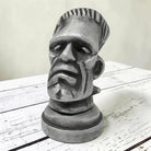 Jones Peak Frankenstein aluminum bottle opener with antiqued finish, shaped like a vintage monster head.