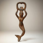 Jones Peak cast iron mermaid bottle opener with a rustic, antiqued finish. Functional barware.