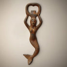 Jones Peak Mermaid cast iron bottle opener with antique finish, 7" long.