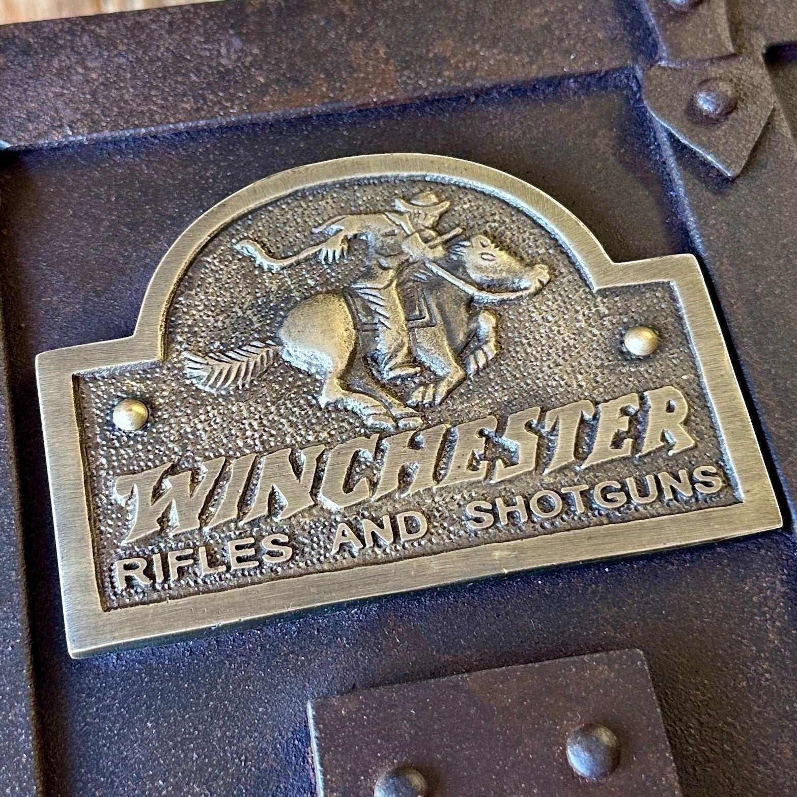 Jones Peak Old West repeating rifle cast iron strong box with Winchester Rifles and Shotguns brass tag and distressed finish.